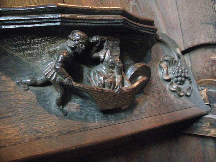 Wives in wheelbarrows were a popular theme of English nursery rhymes. The fact that the husband in this example is wearing a kilt seems to be a joke at the expense of the Scots - which is not surprising given that a great deal of the Durham Prince Bishop's identity comes from their role as protectors of the northern English border